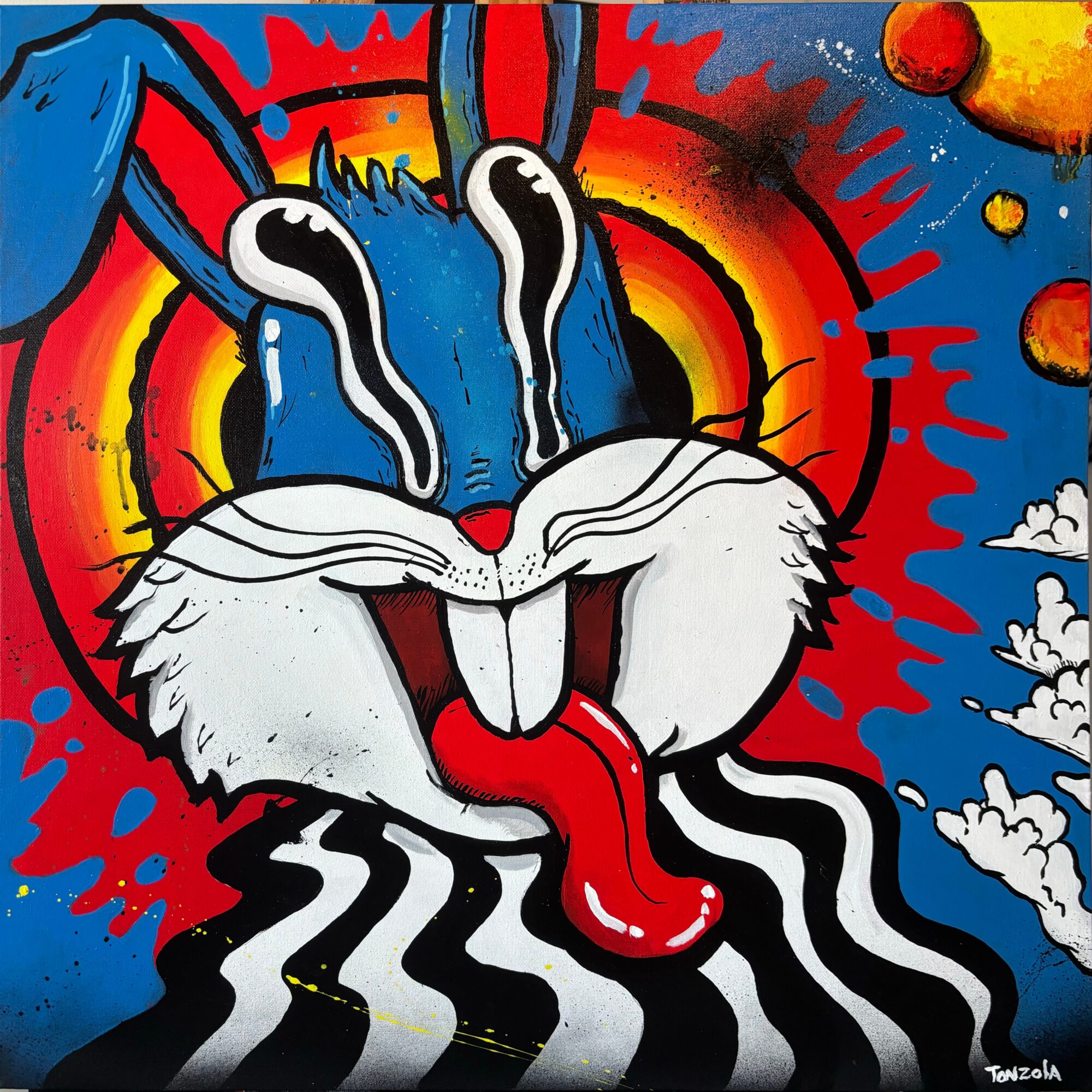 Colorful cartoon rabbit with a big smile, sticking out tongue, surrounded by vibrant background elements.