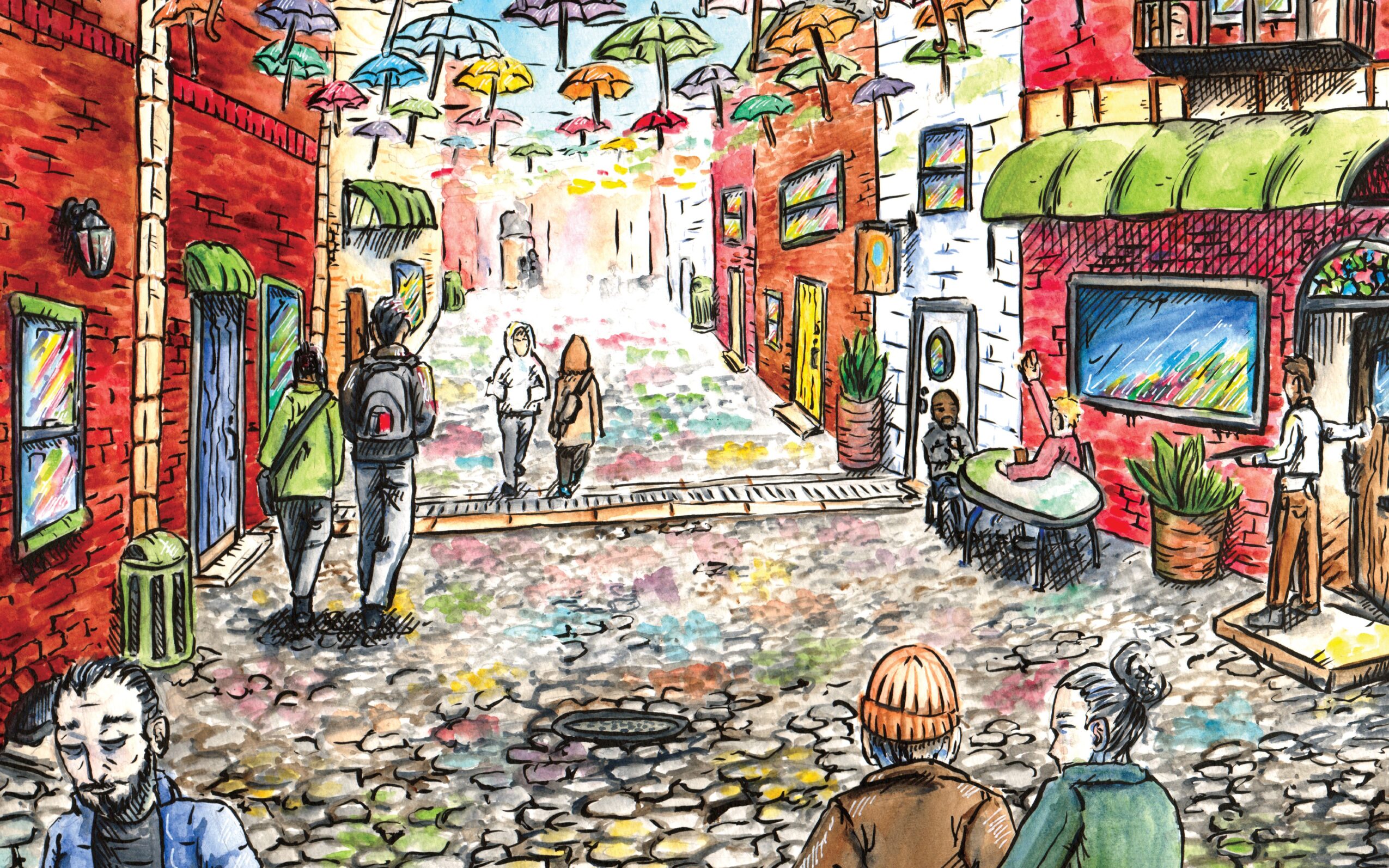 Colorful street scene with umbrellas hanging overhead, people walking, and buildings with shops and outdoor seating.