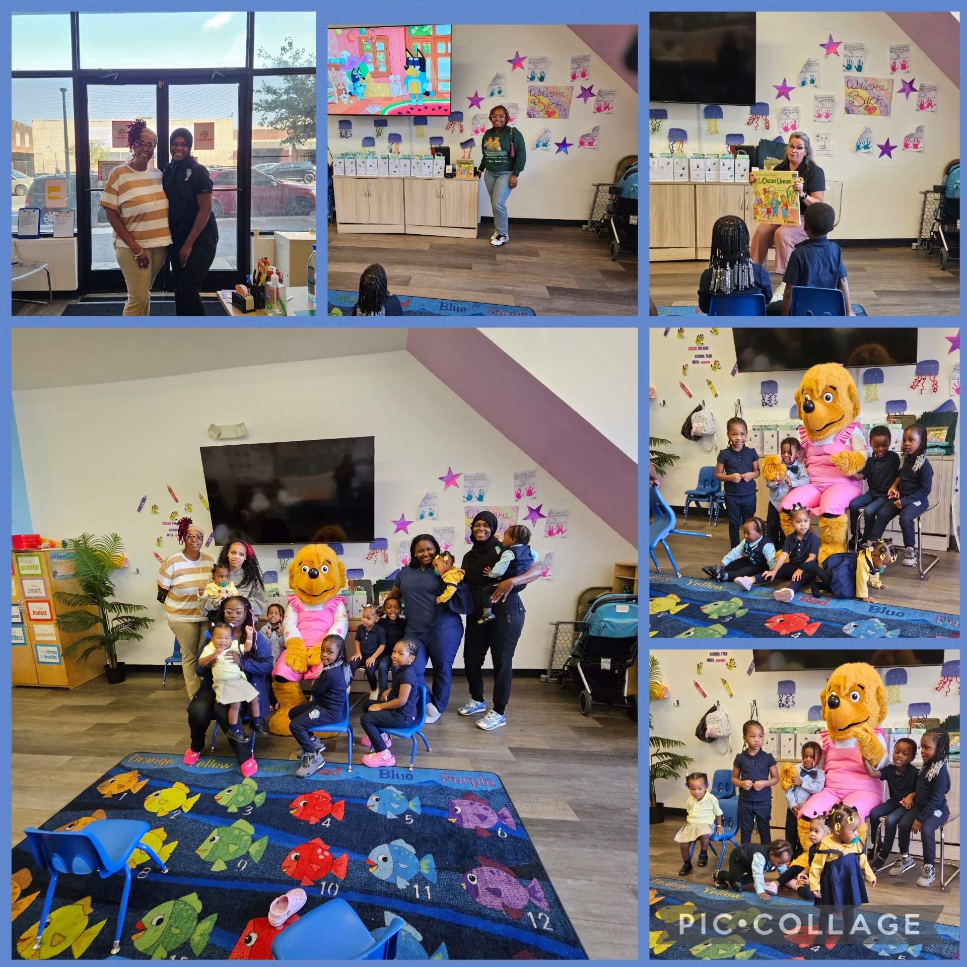 Group of children and adults in a room with a large TV, colorful wall decorations, and a dog mascot, engaging in activities.