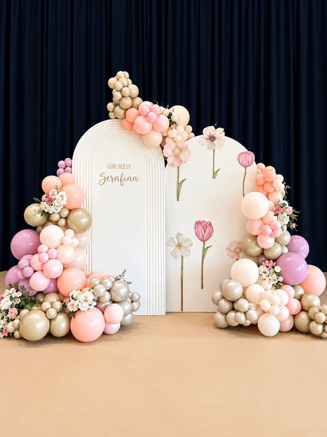 Decorative backdrop with balloons and flowers, featuring a white door and pink flower illustrations, set against a dark curtain.